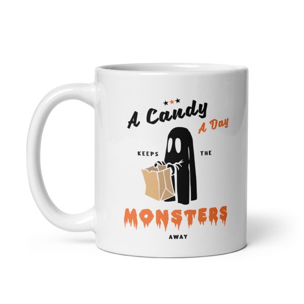 A candy a day keeps the monsters away funny Halloween coffee mug / cup - Image 2