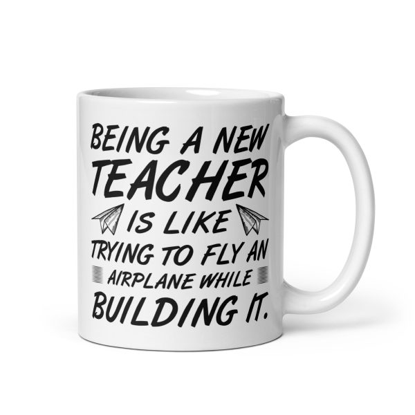 Being a new teacher is like trying to fly an airplane while building it funny coffee mug / cup